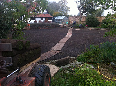 ground prepared boarded and turf laying started