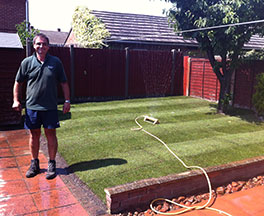 Fresh green turf laid on a small lawn