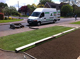 Turf laying brilliant lawn van. Fresh green turf 